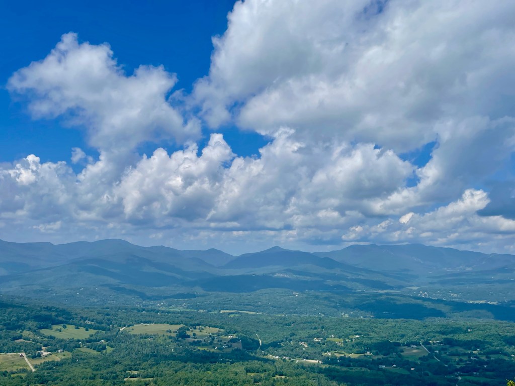 Mountains and grasslands on a summer day.