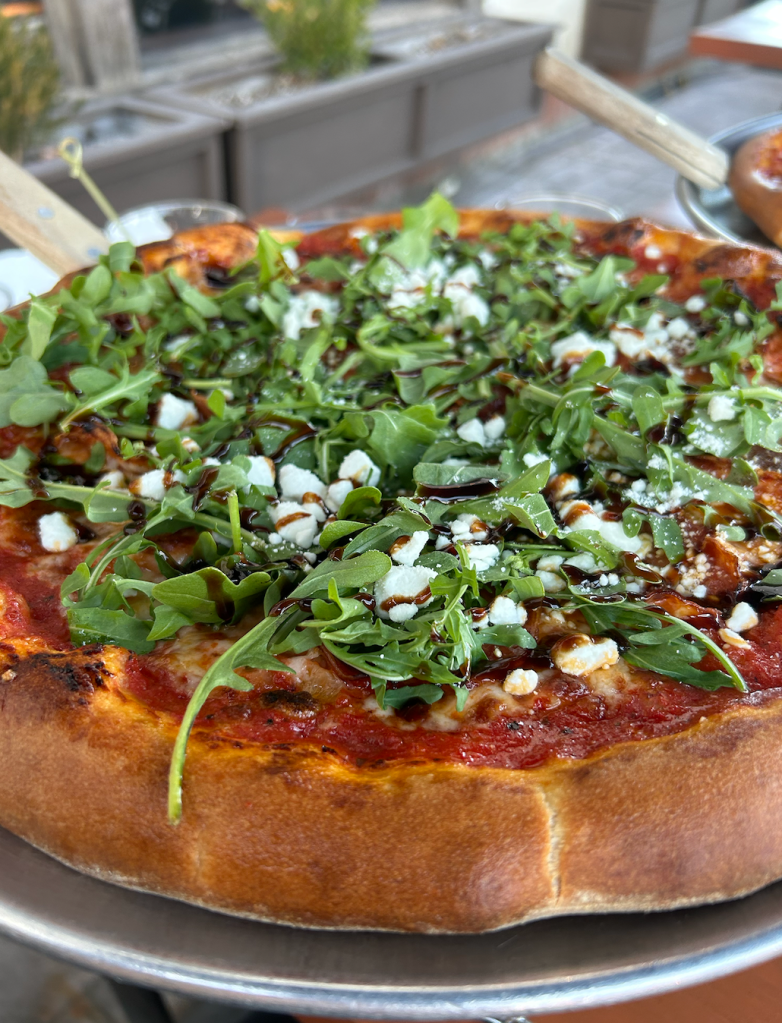 pizza with arugula topping